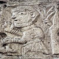 Man Carrying a Hammer