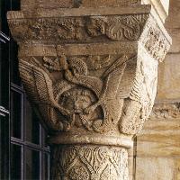 Capital with mask and dragons