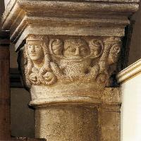 Capital with bearded mask and heads